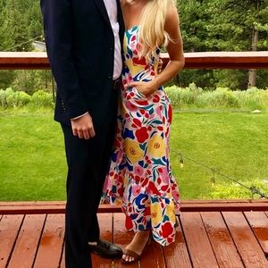 Floral dress, high front to low back, with pockets and adjustable straps